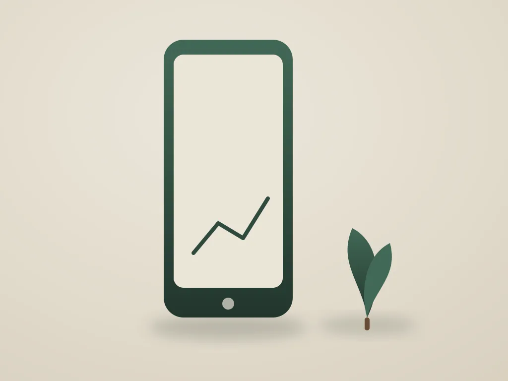 Smartphone met stijgende grafiek naast een jong blad